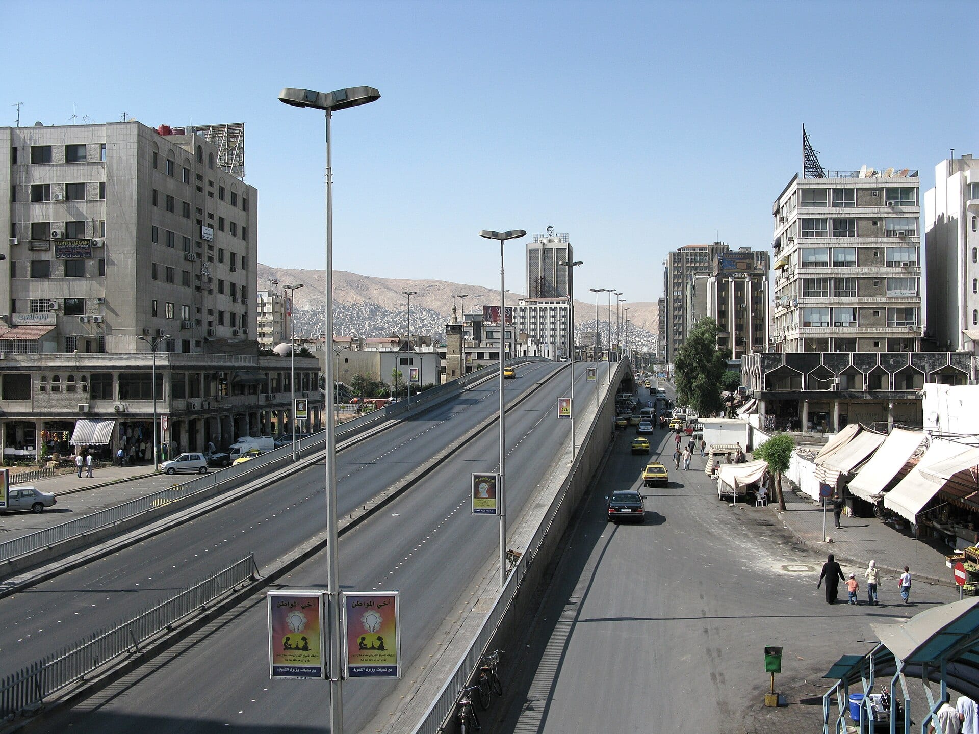 A highway running out of Damascus towards open country.