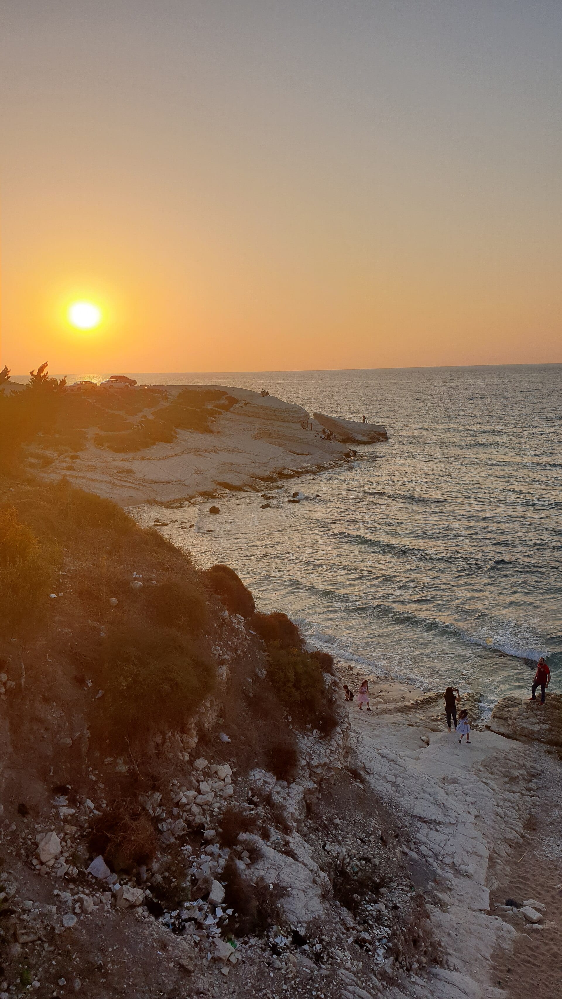 Sunset over the rocky Mediterranean shore near Salib al-Turkman, Latakia.